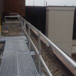 Custom Rooftop Fall Protection Guardrail and walkway Systems for a Hospital Roof