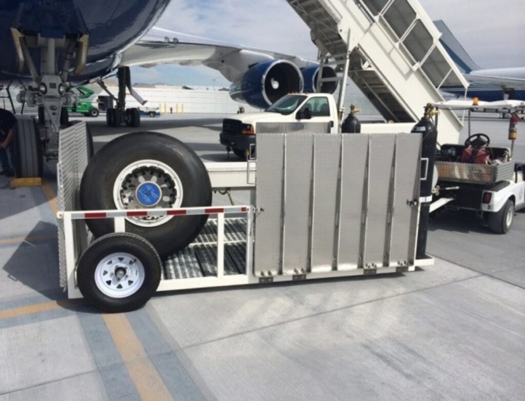 Wheel and brake service cart in use on tarmac