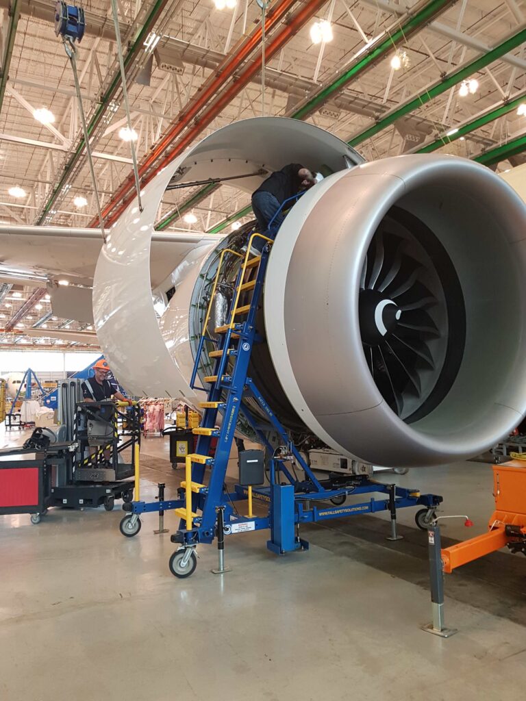 engine access stand in use under engine cowling