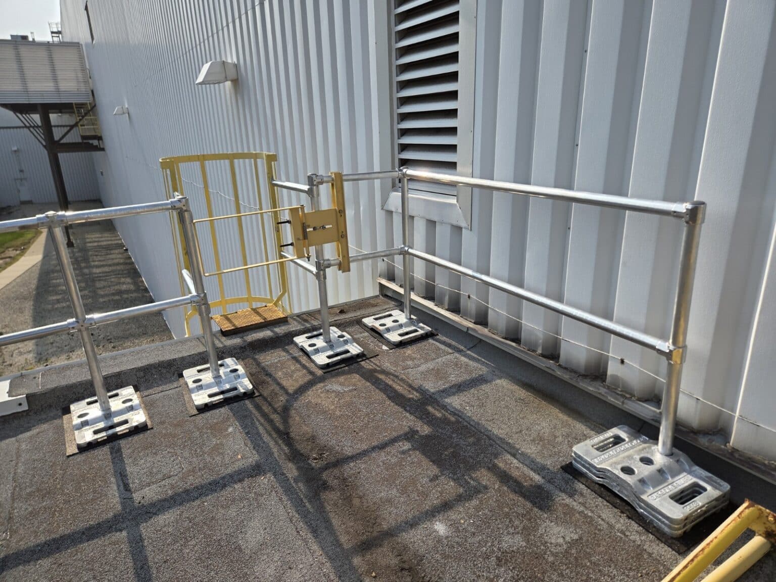 Compliant Guardrail System Safe and Compliant Rooftop Guardrail System for Industrial Food Plant ...
