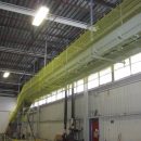 Ceiling mounted Conveyor netting in clothing distribution warehouse | Safety netting