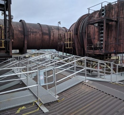 Integrated Walkway and Guardrail System on Sloped Steel Roof